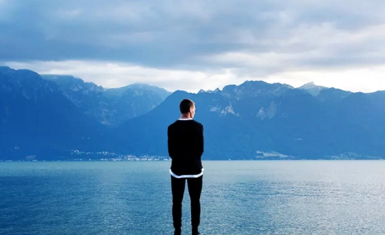 Man admiring a lake