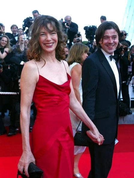 405407 11: French actress Jane Birkin and an unidentified companion arrive for the opening ceremony at the 55th International Film Festival May 15, 2002 in Cannes, France. Twenty-two films are competing for the prestigious Palme d''Or prize at the film jamboree on the French Riviera. (Photo by Pascal Le Segretain/Getty Images)