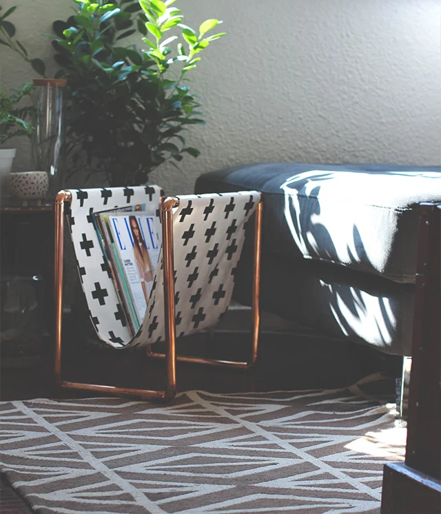 Copper magazine stand by Zana 