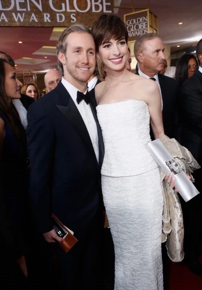 BEVERLY HILLS, CA - JANUARY 13: Actress Anne Hathaway (R) and husband Adam Shulman arrive at the 70th Annual Golden Globe Awards held at The Beverly Hilton Hotel on January 13, 2013 in Beverly Hills, California.  (Photo by Alexandra Wyman/Getty Images for smartwater)
