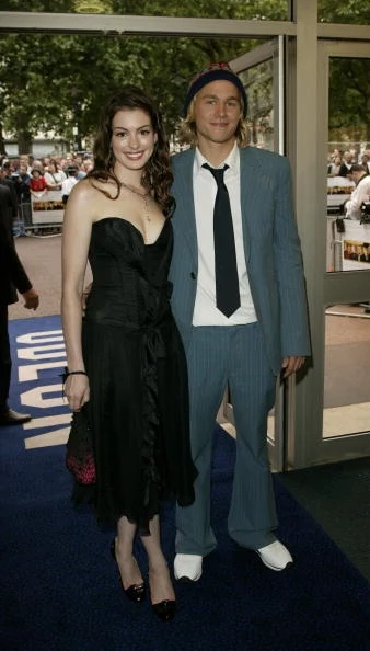 LONDON - JUNE 22:  (UK NEWSPAPERS OUT) Cast members Charlie Hunnam and Anne Hathaway arrive at the Nicholas Nickleby premiere at the Warner Village Cinema West End June 22, 2003 in London, United Kingdom.  (Photo by Dave Hogan/Getty Images)