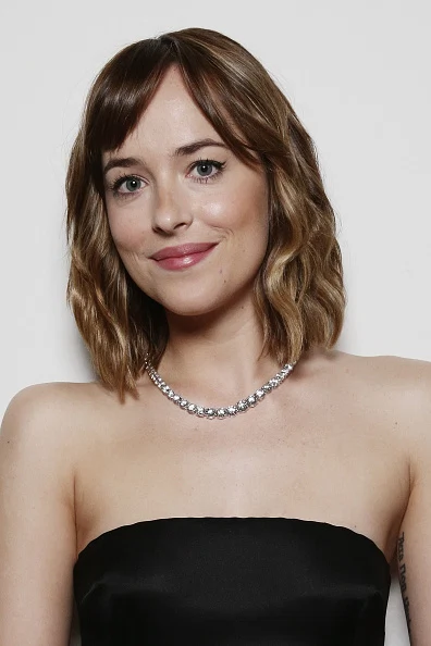 MILAN, ITALY - SEPTEMBER 26: Dakota Johnson poses at amfAR Milano 2015 at La Permanente on September 26, 2015 in Milan, Italy. (Photo by Vittorio Zunino Celotto/Getty Images for amfAR)