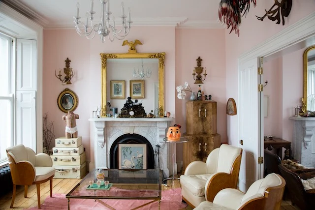The middle floor, double living room exudes grandeur and Ruth's eclectic character.