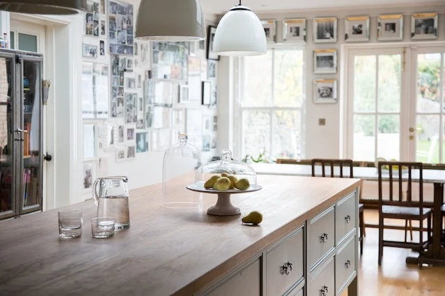 The kitchen is designed by Andrew Ryan and painted in Farrow & Ball's Light Blue.