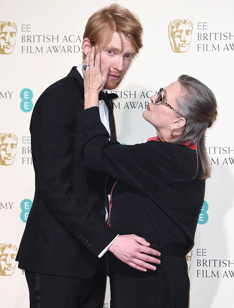poses in the winners room at the EE British Academy Film Awards at the Royal Opera House on February 14, 2016 in London, England.