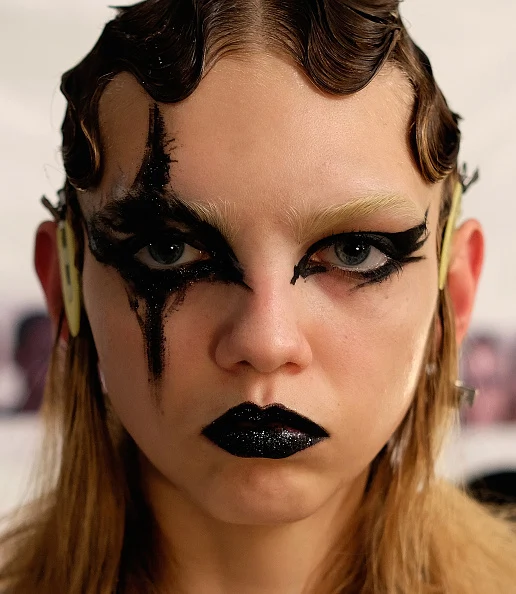 NEW YORK, NY - FEBRUARY 18: A model prepares backstage at Marc Jacobs Fall 2016 fashion show during new York Fashion Week at Park Avenue Armory on February 18, 2016 in New York City. (Photo by Dimitrios Kambouris/Getty Images for Marc Jacobs)
