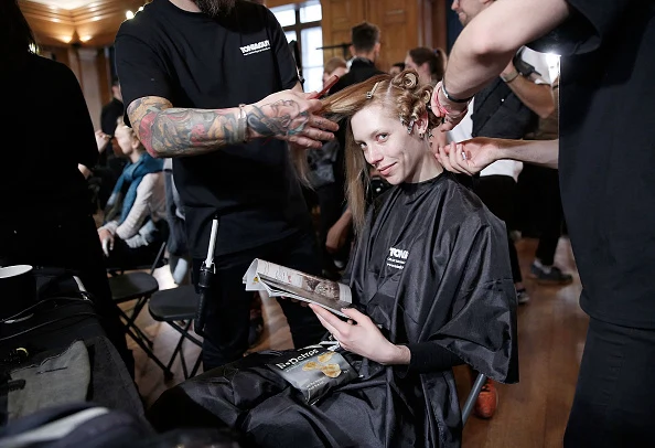 LONDON, ENGLAND - FEBRUARY 21: Models backstage ahead of the Vivienne Westwood show during London Fashion Week Autumn/Winter 2016/17 at Royal College of Surgeons on February 21, 2016 in London, England. (Photo by John Phillips/Getty Images)