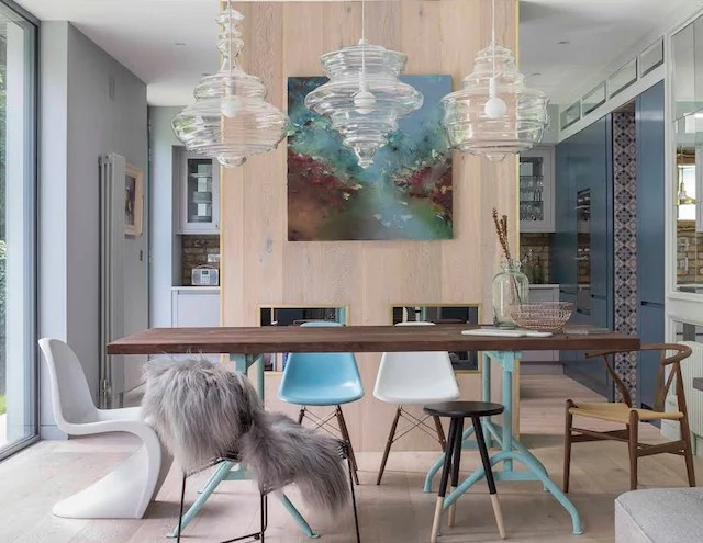 Pictured here and above, this Ballsbridge extension adds considerable space and light to an established family home.