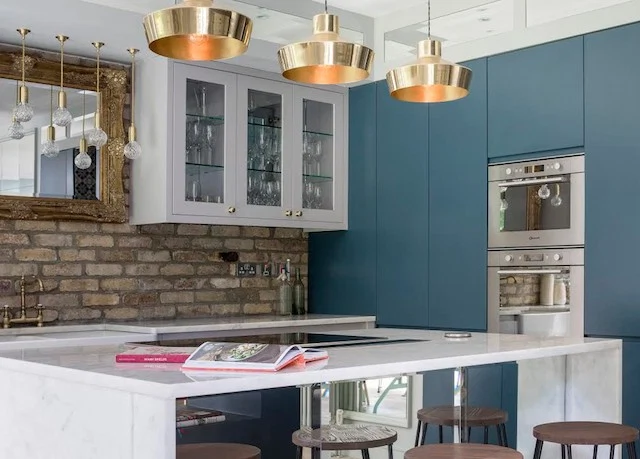 The project involved knocking two homes into one and devising a complete reconfiguration of the space as well as the extension to the rear.