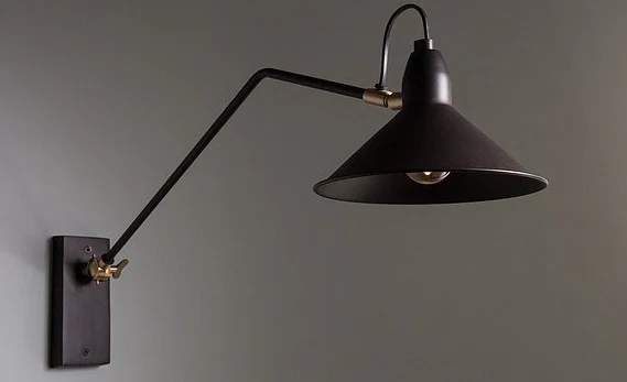 Adjustable Patt wall lamp, €129, April and the Bear