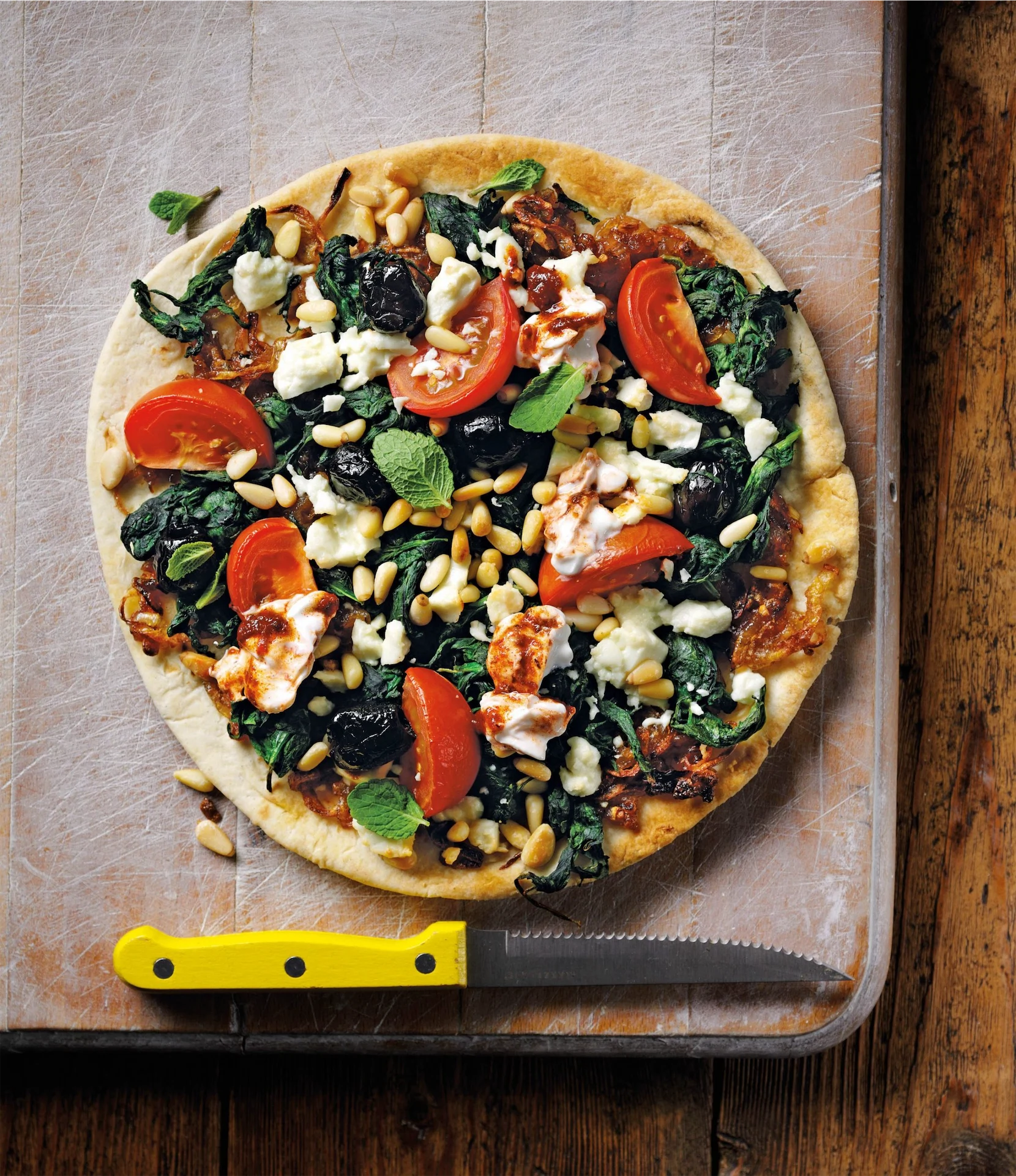 Lebanese flatbread pizza with onions & harissa