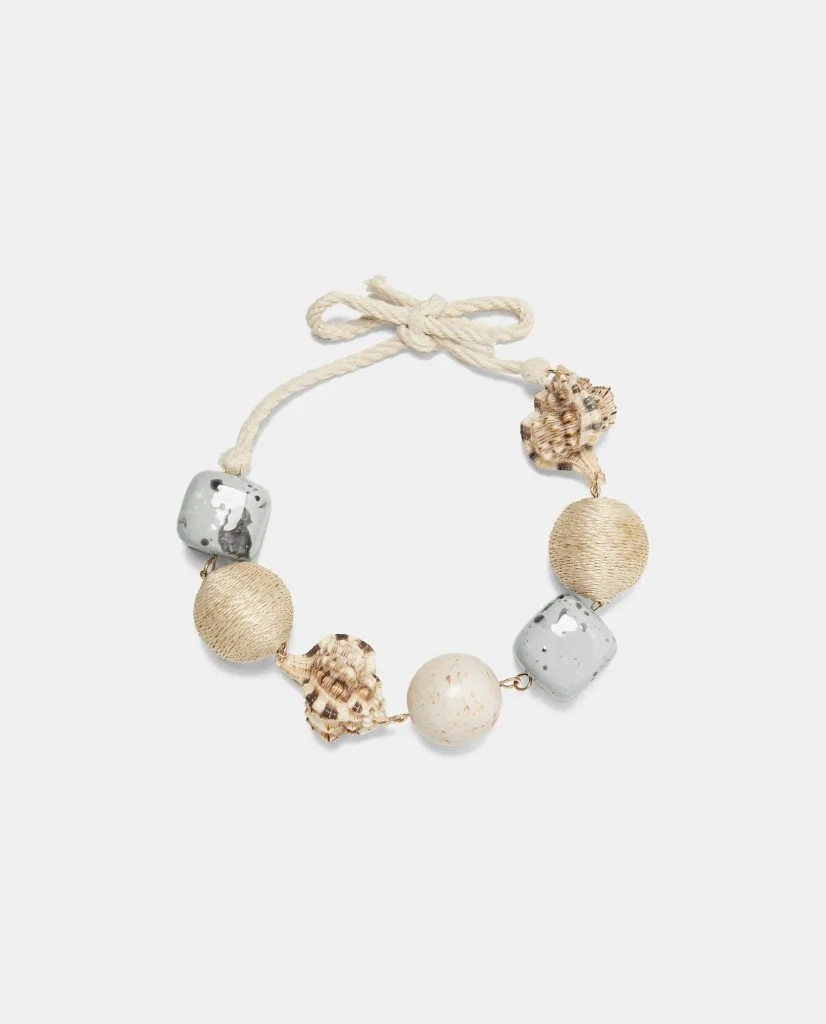 Chord necklace with conch shells, €17.95 at zara.com