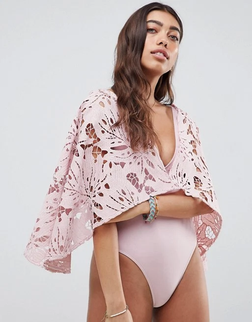 Premium lace cape plunge swimsuit by Asos Design, €48.39 at asos.com