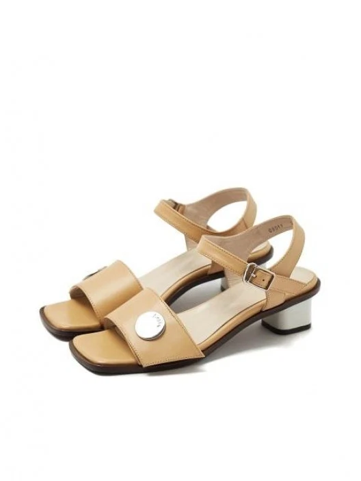 Beige sandals by Loyiq, €243.38 at wconcept.com