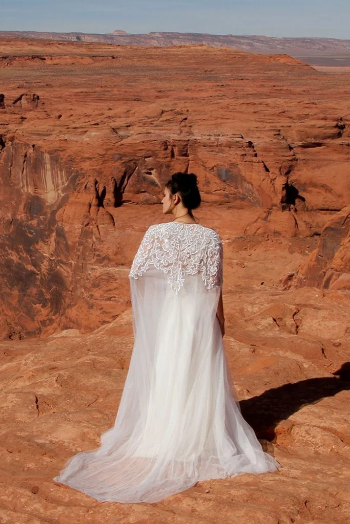 Embellished cape, available at folkster.com