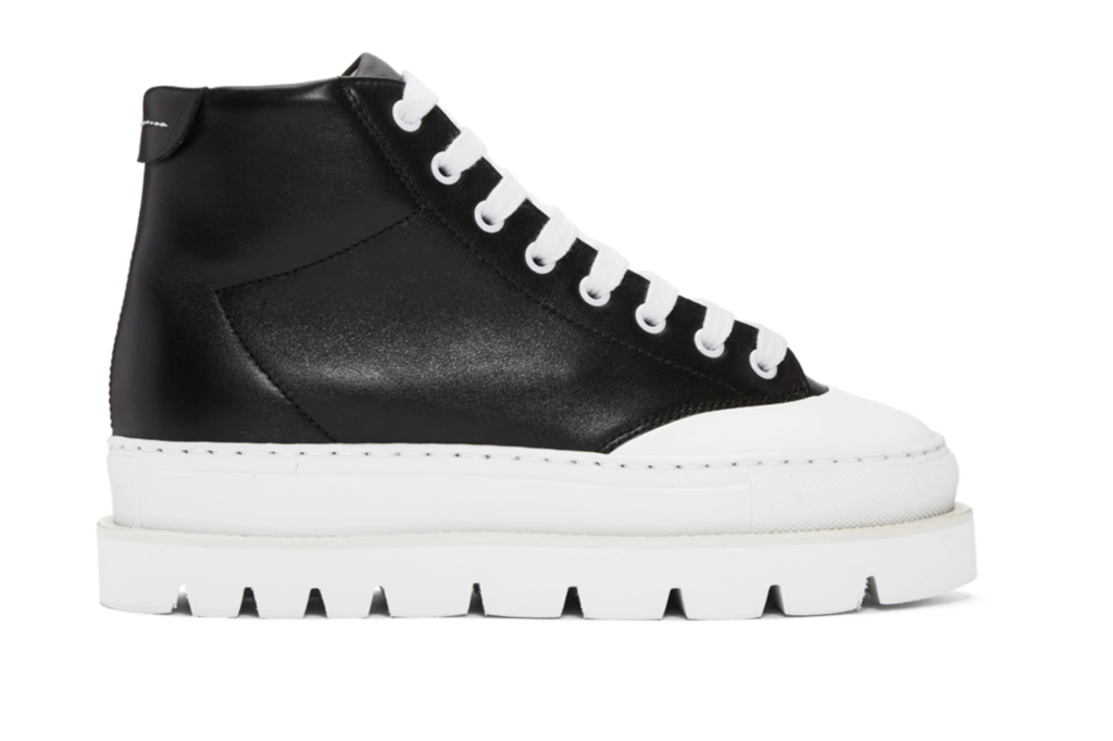 Black leather hiking boots by MM6 Maison Martin Margiela, €490 at ssense.com