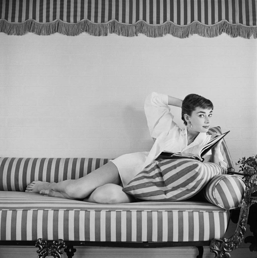 Audrey Hepburn on a striped lounger by Mark Shaw, €671.80