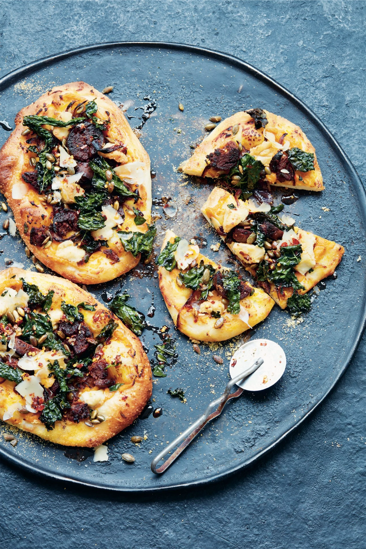 Vegan flatbread pizzas with squash purée & crispy cavolo nero