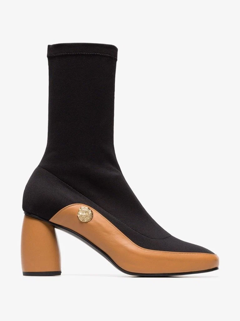 Black and brown curved 90 leather sock boots by Reike Nen, €422.26 at brownsfashion.com