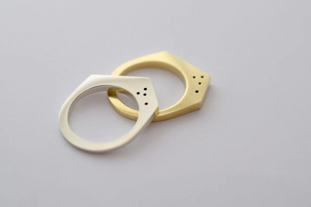9 karat gold and sterling silver rings, €297 each at isle-jewellery.com