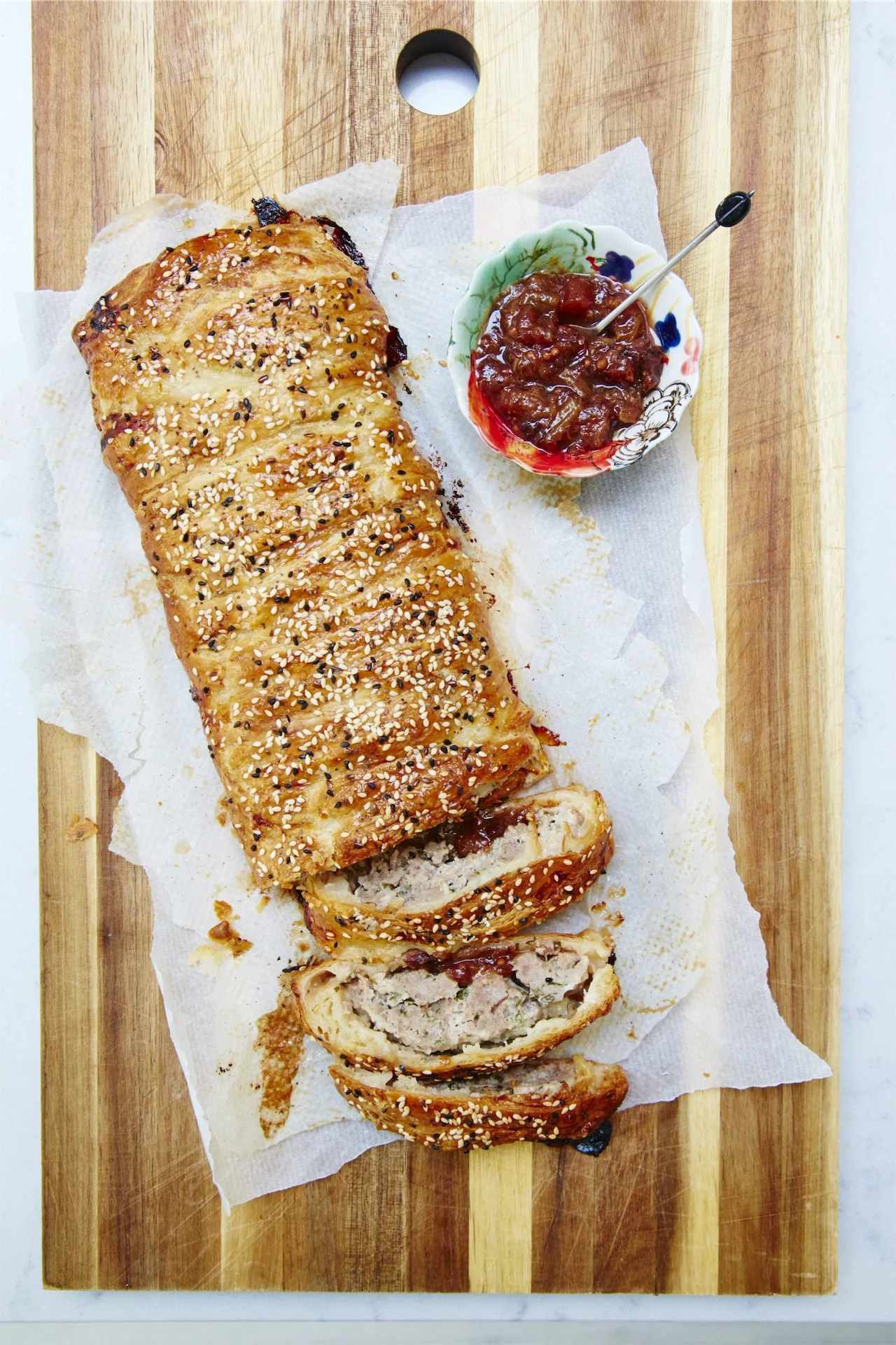 Perfect party food: massive sausage roll with chutney stripes