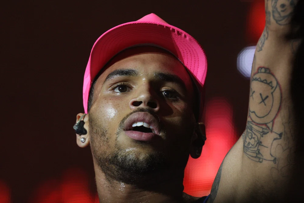 Chris Brown has been arrested in Paris on suspicion of rape Chris Brown has been arrested in Paris on suspicion of rape