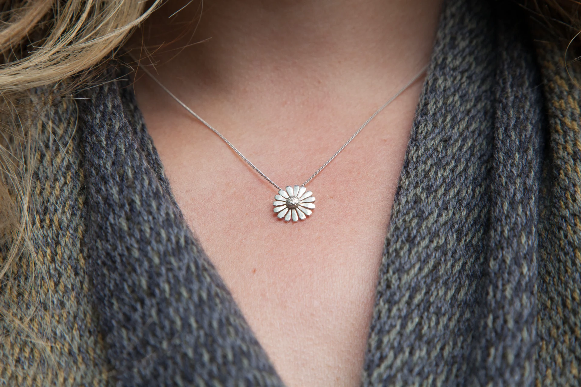 Award-winning Irish designers create unique daisy pendant in aid of GOAL