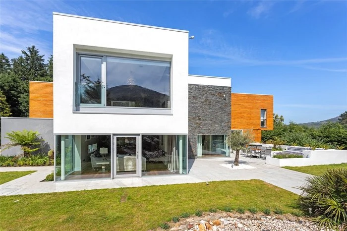 This modern home in Kilmacanogue with gym, cinema and sauna is on the market for €3.25 million This modern home in Kilmacanogue with gym, cinema and sauna is on the market for €3.25 million