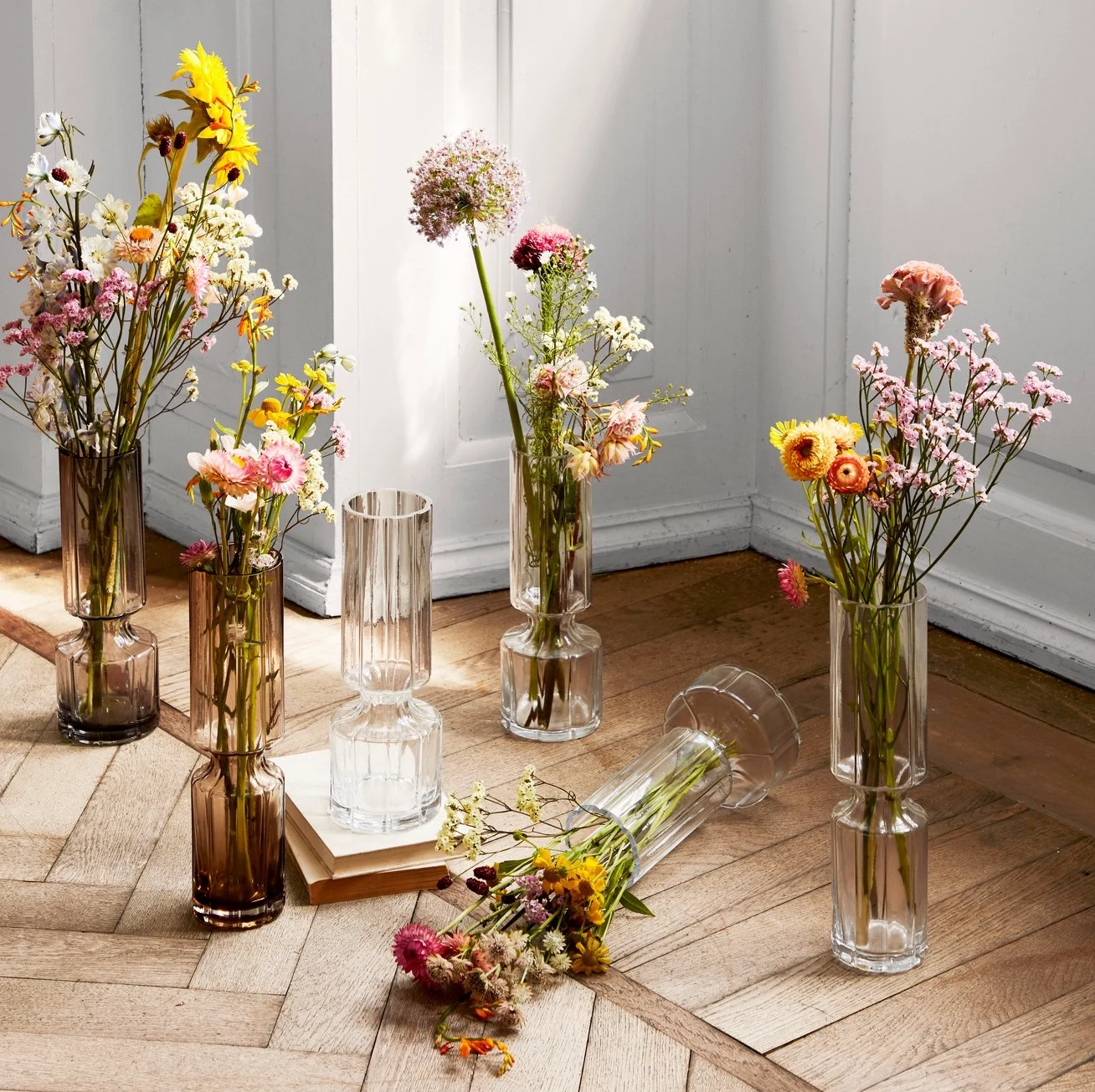 We’re loving coloured glass at the moment, from blush candlesticks to sepia vases