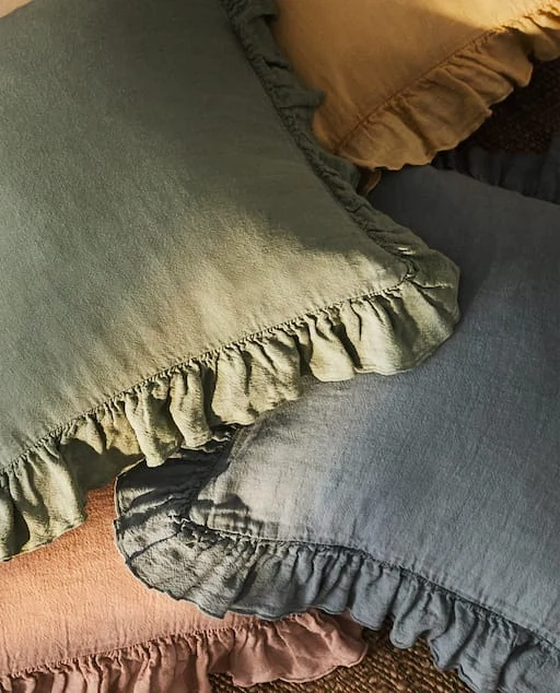Linen cushion cover with ruffles, €22, Zara Home
