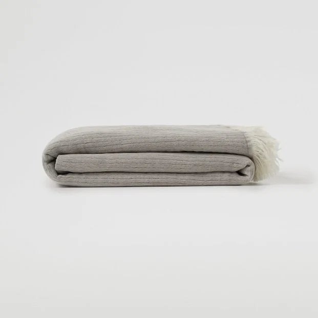 Fringed cotton blanket, €49.99