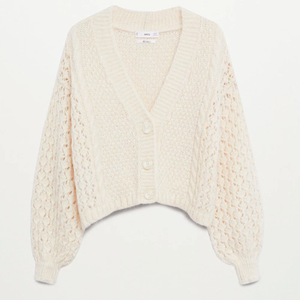 Openwork knit cardigan, €49.99, Mango