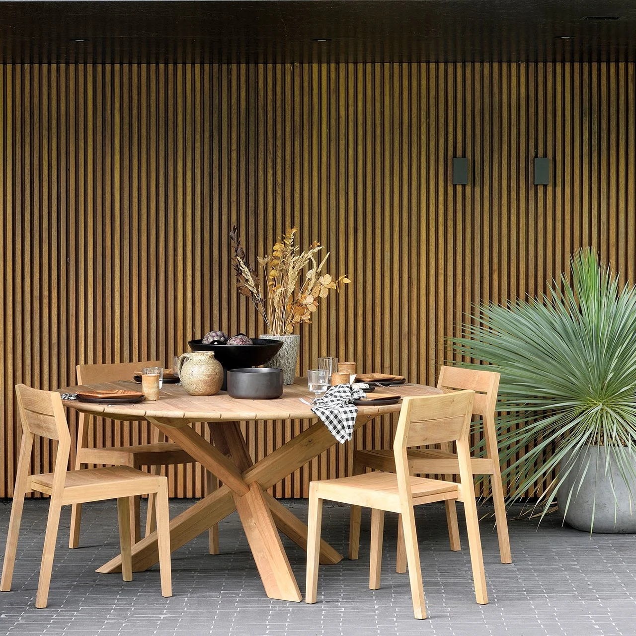 An interiors expert shares her tips for your outdoor space, from furniture choices to finishing touches