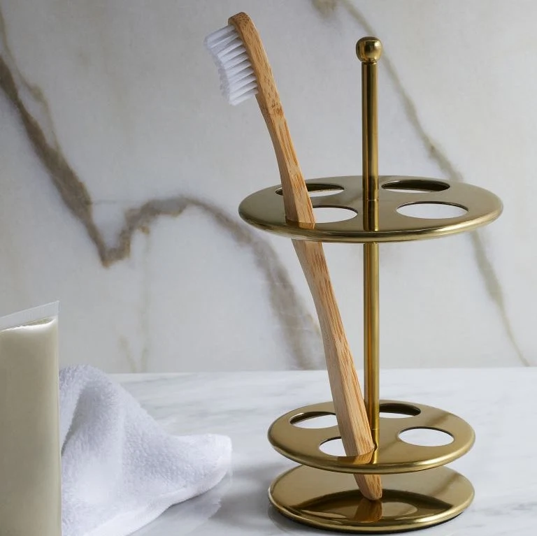 Metal toothbrush holder, €12.99, H&M