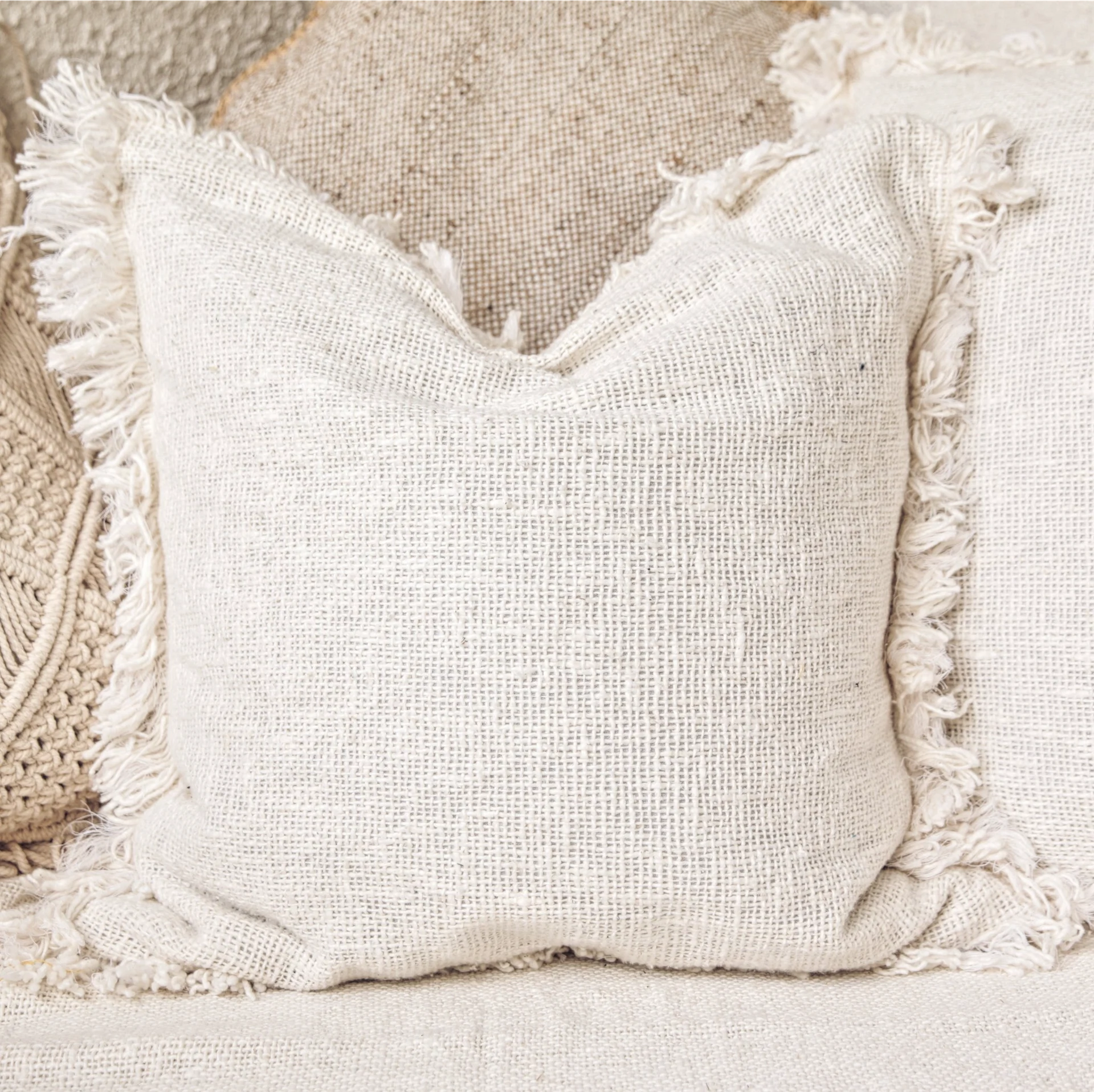 White raw cushion cover, €44, Mano