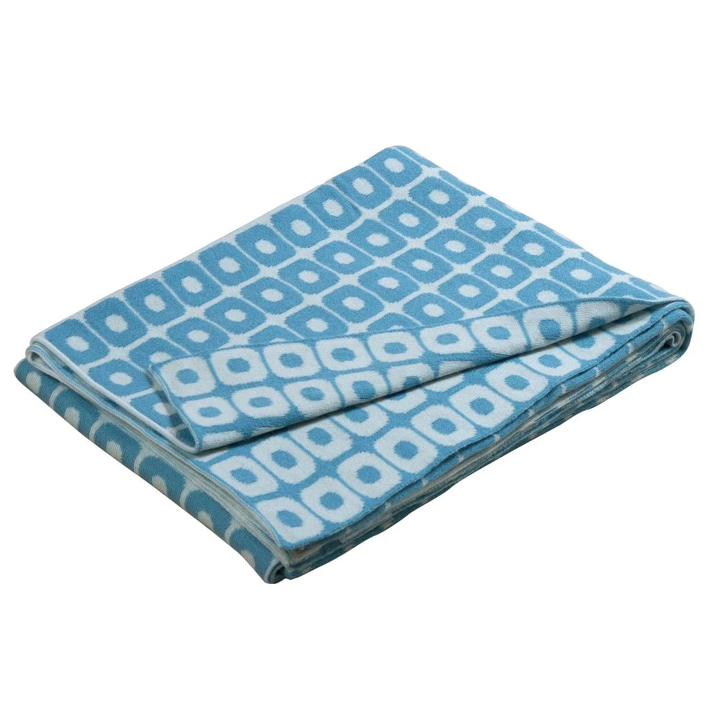 Soft blue loom throw, €107, Hedgeroe