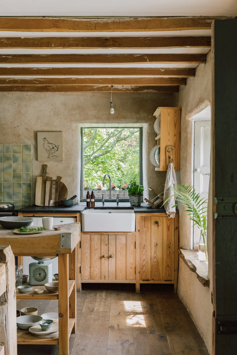 Light floods the kitchen, where the family spend most of their time – eating, playing games and computers. Photography by Shantanu Starick, Styling by Ciara O’Halloran