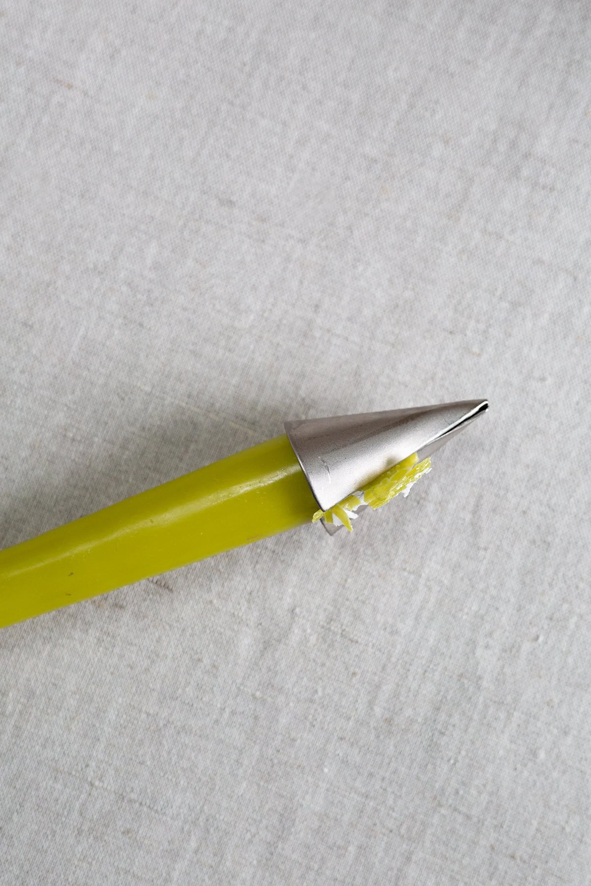 Base shaver for too-thick dinner candles, €5