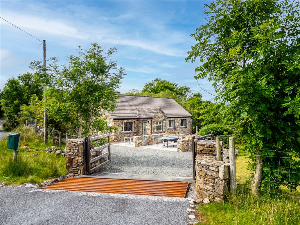 This stone-clad home set in a beautiful Galway valley is on the market for €350,000