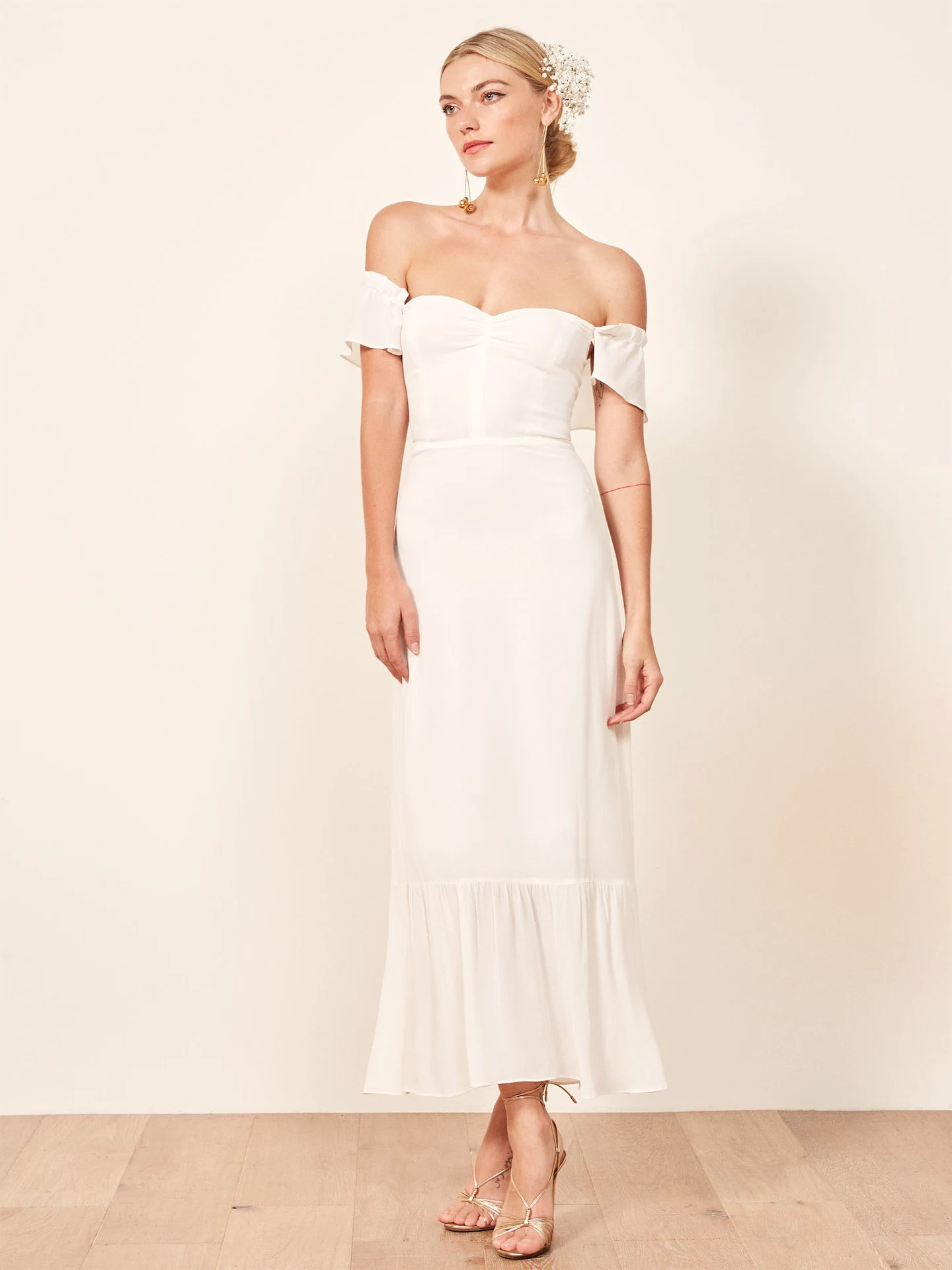 Butterfly Dress Ivory, €340, Reformation