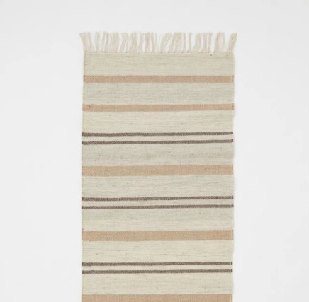 Wool-blend rug, €36 was €59.99, H&M