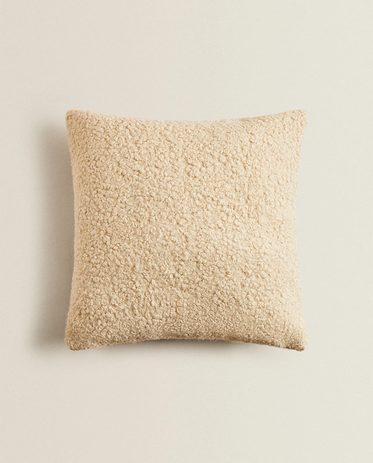 Bouclé knit cushion cover, €22.99, Zara Home