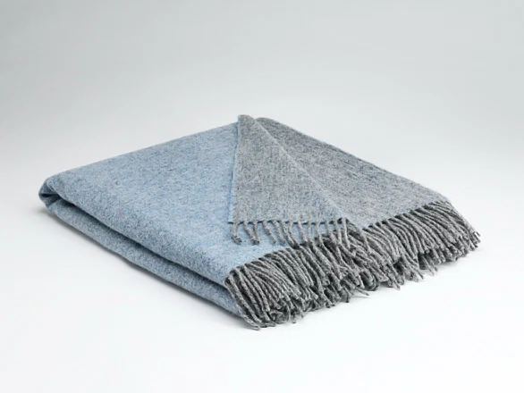 Starlight blue throw, €87, McNutt of Donegal