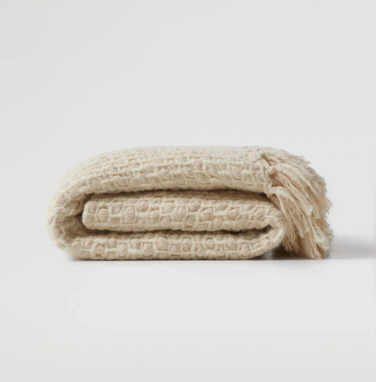 Textured cotton blanket, €49.99, Mango