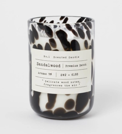 Scented candle in glass holder, €14.99, H&M