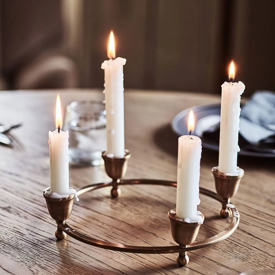 Luna brass candle centrepiece, £38, Rowen & Wren