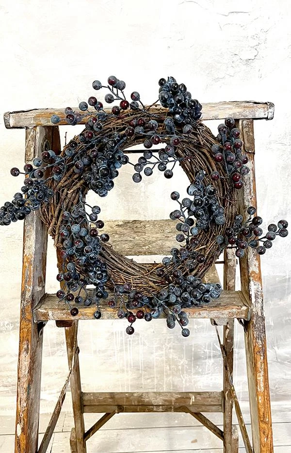 Decorative wreath with berries, €19.95