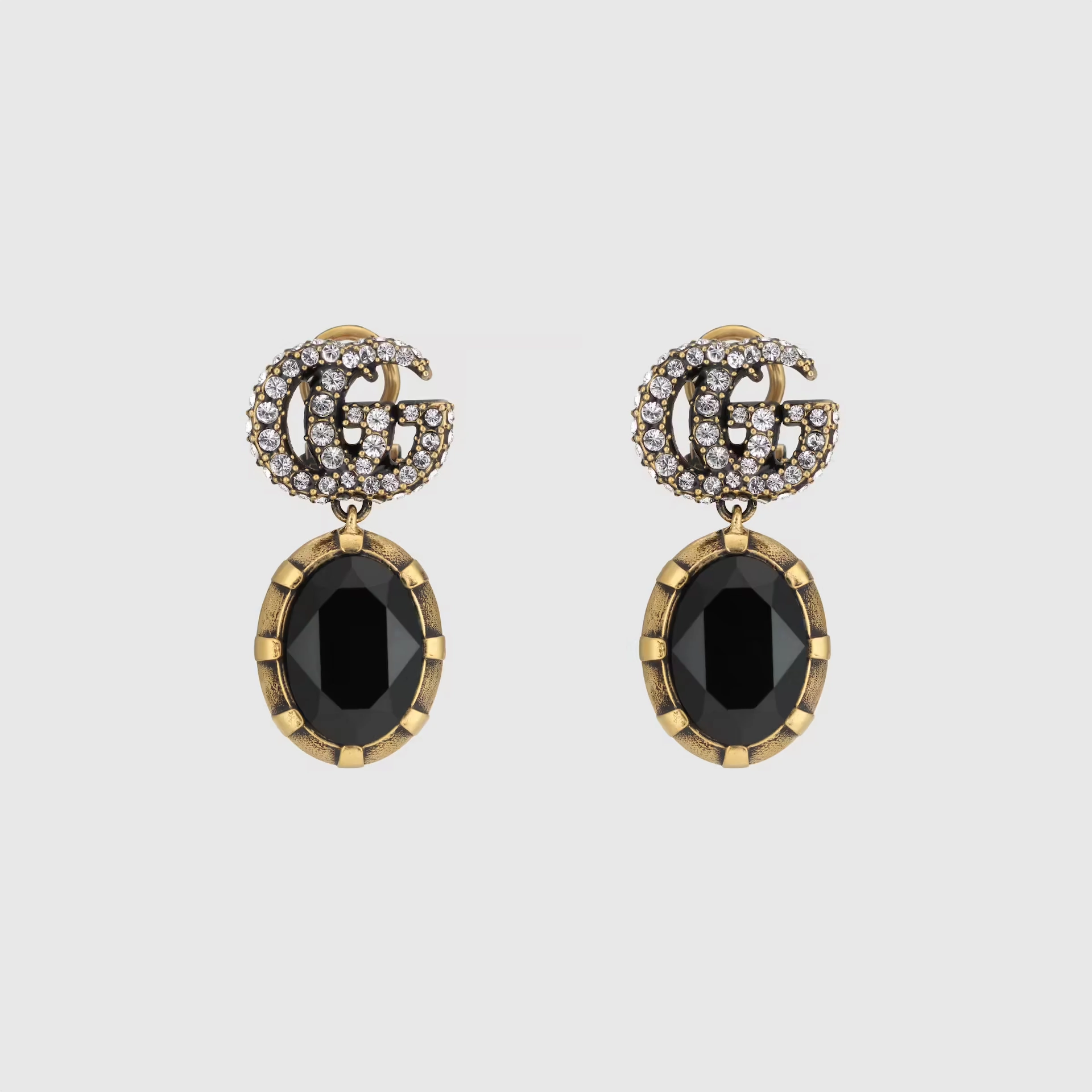 Double G Earrings With Black Crystals, €320, Gucci