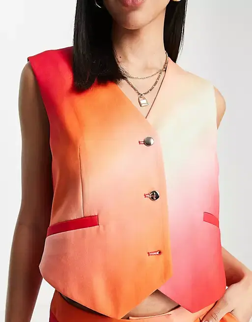 Annorlunda ombre waistcoat, €52.99, ASOS