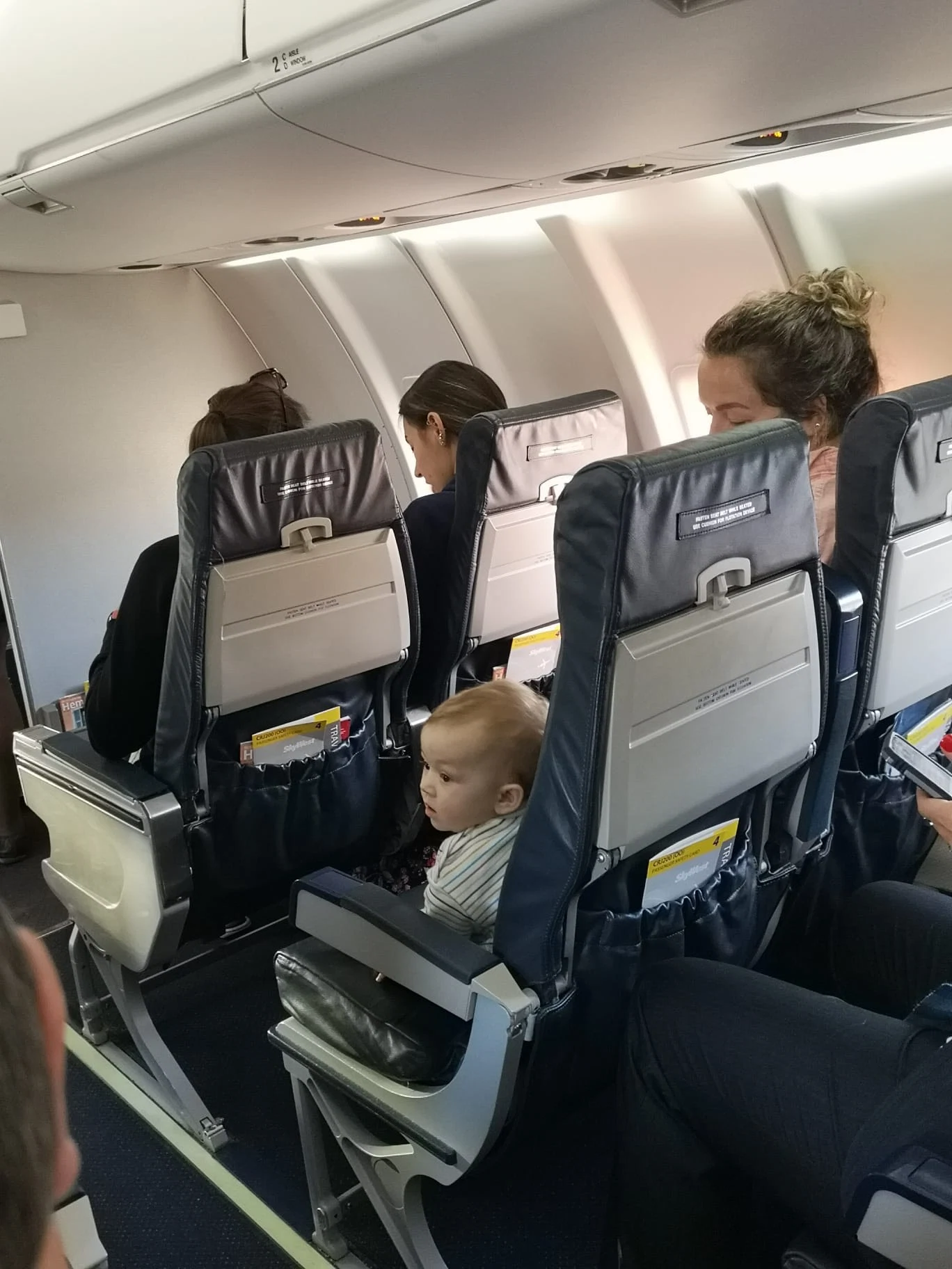5Air travel with baby: Rosemary MacCabe and her baby on a flight